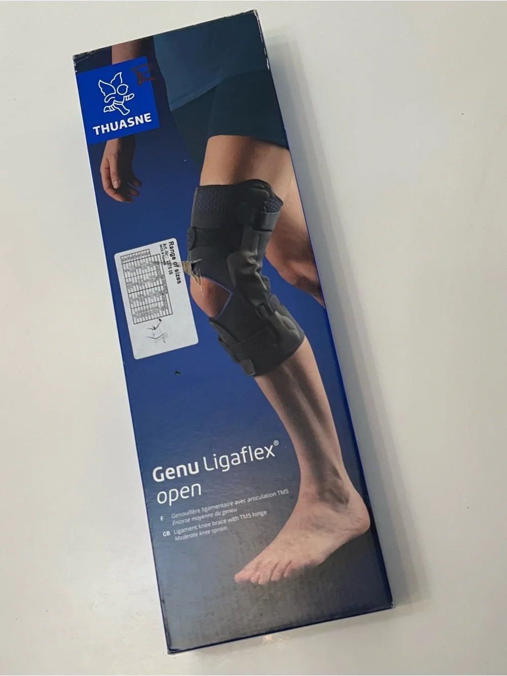 New Thuasne Genu Ligaflex Adjustable Black Neoprene Knee Brace with Blue Trim